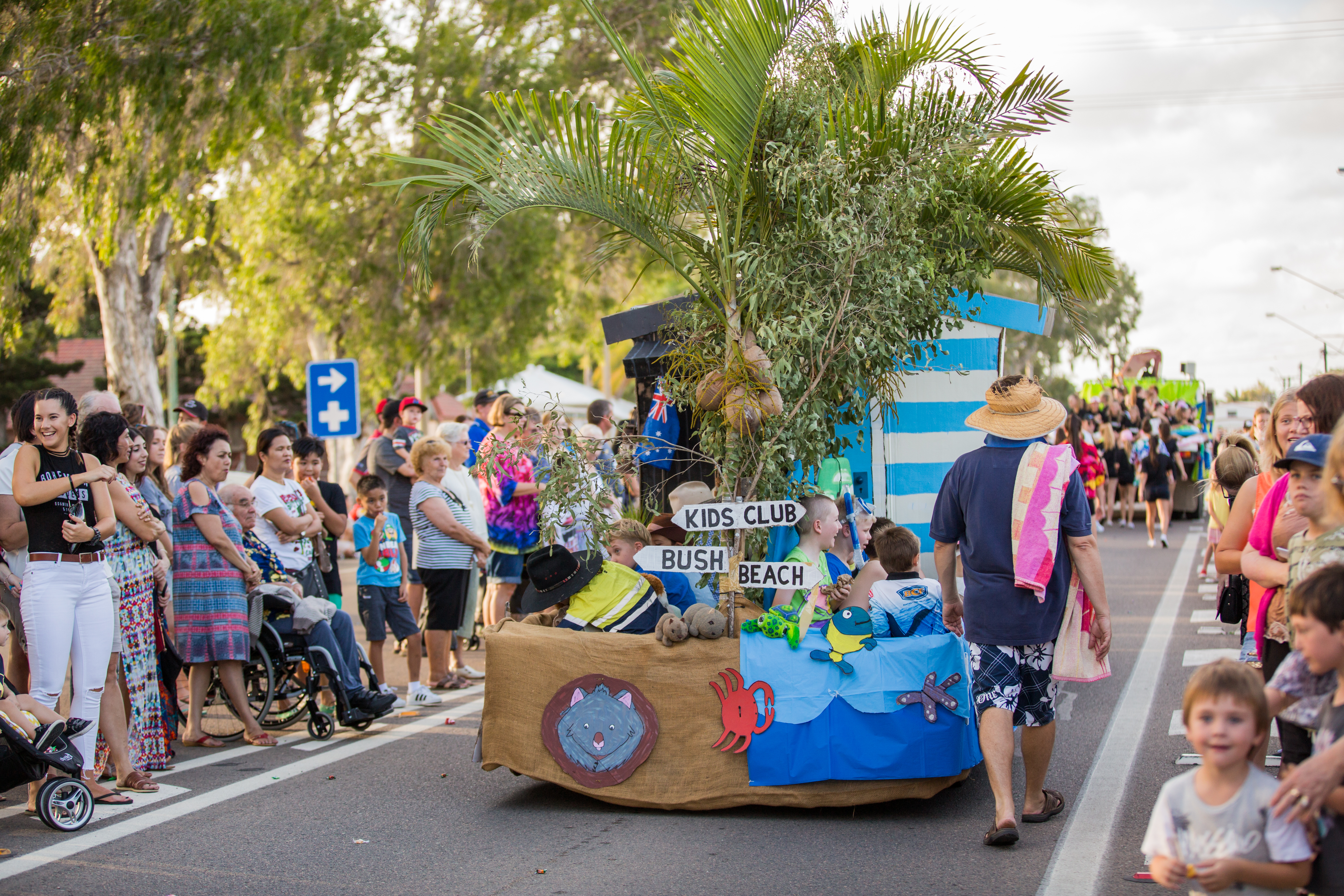 A float surrounded by people at the Home Hill Harvest Festival